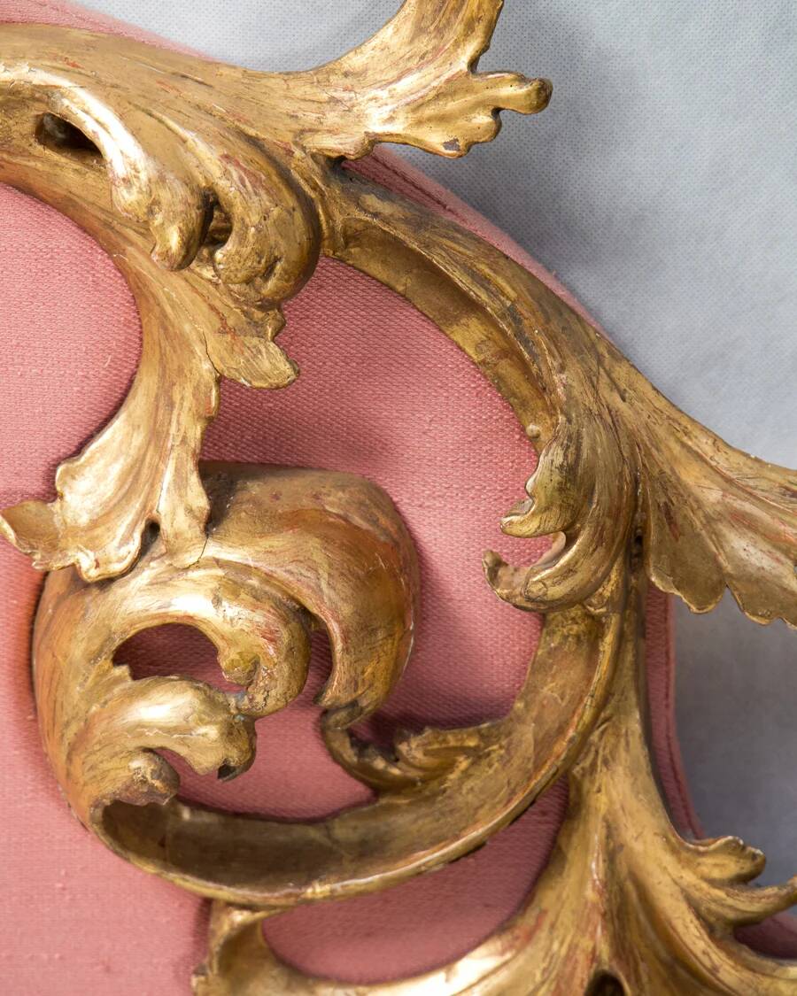 Italian rococo-style headboard in carved gilded wood, 19th century.