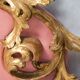 Italian rococo-style headboard in carved gilded wood, 19th century.
