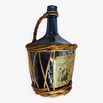 Dame Jeanne blue glass and wicker bottle