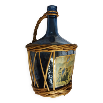 Dame Jeanne blue glass and wicker bottle