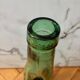 Vintage Viresa bottle in a flattened shape.