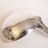 Silver plated metal service: 12 soup spoons, 12 forks and ladle.