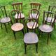 Set of 8 mismatched bistro chairs