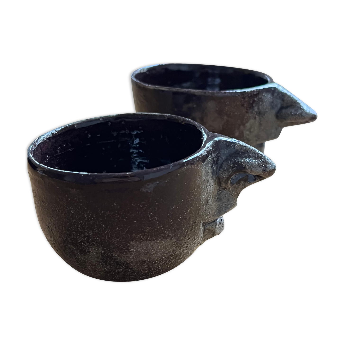 Ceramic coffee cups human nose and mouth