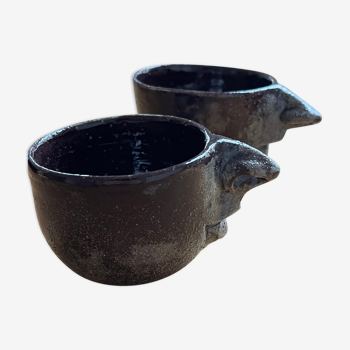 Ceramic coffee cups human nose and mouth