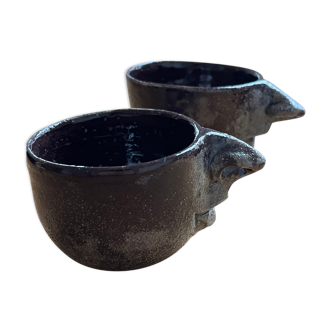 Ceramic coffee cups human nose and mouth