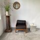 Modernist armchair in exotic wood and leather