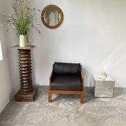 Fauteuil moderniste bois exotique et cuir