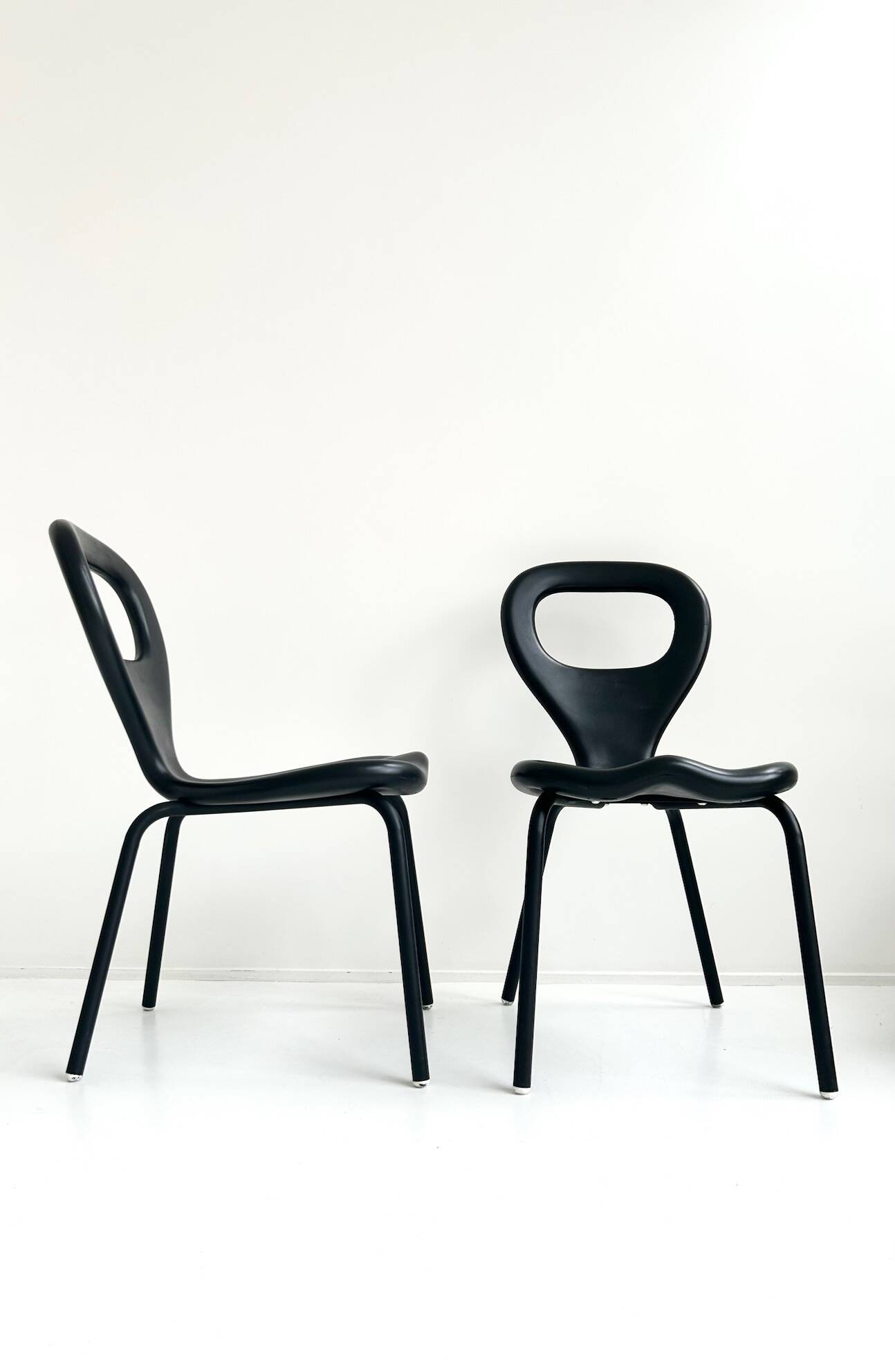 Pair of "TV chairs" by Marc Newson for Moroso 1993