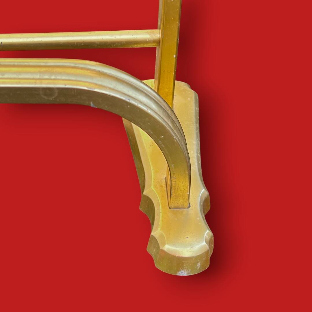 Vintage wall-mounted coat rack in anodised gold aluminium with hat holder.