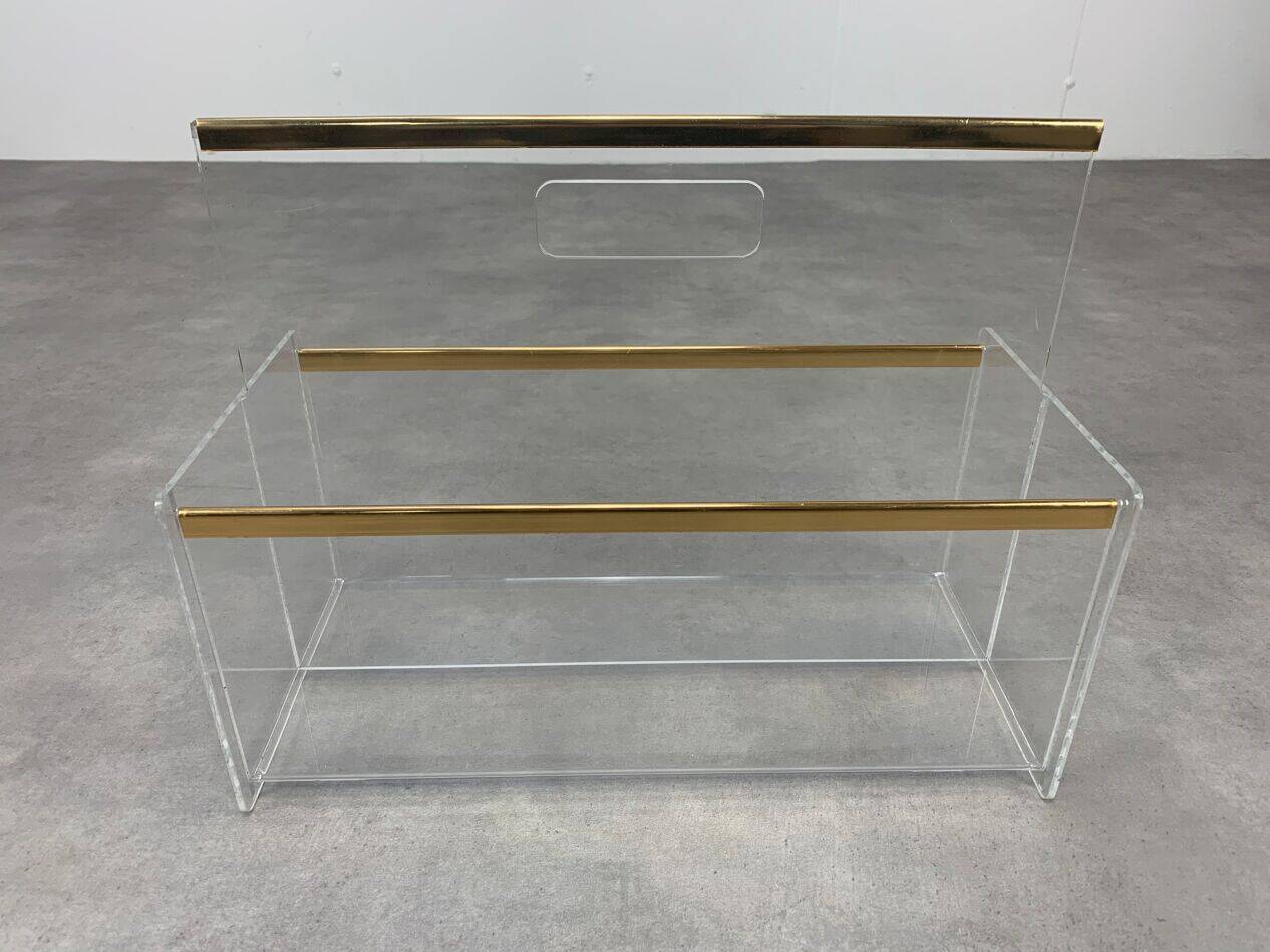 Plexiglass and brass magazine rack from the 70s in Hollywood Regency style.
