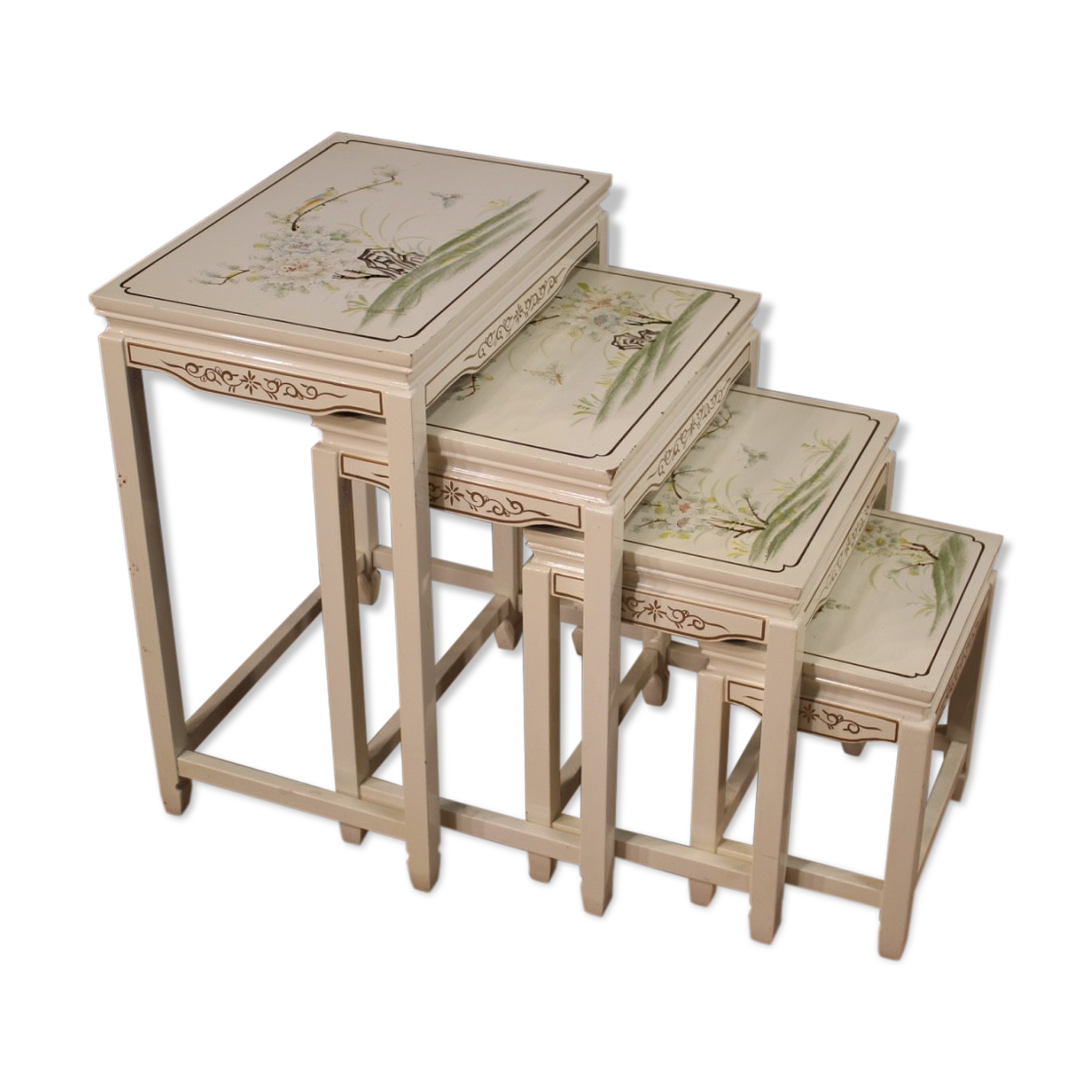 Four lacquered and painted living room coffee tables