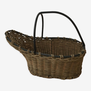 Wicker and black metal bottle holder