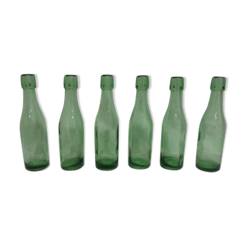 Série de 6 bouteilles à soda anciennes en verre