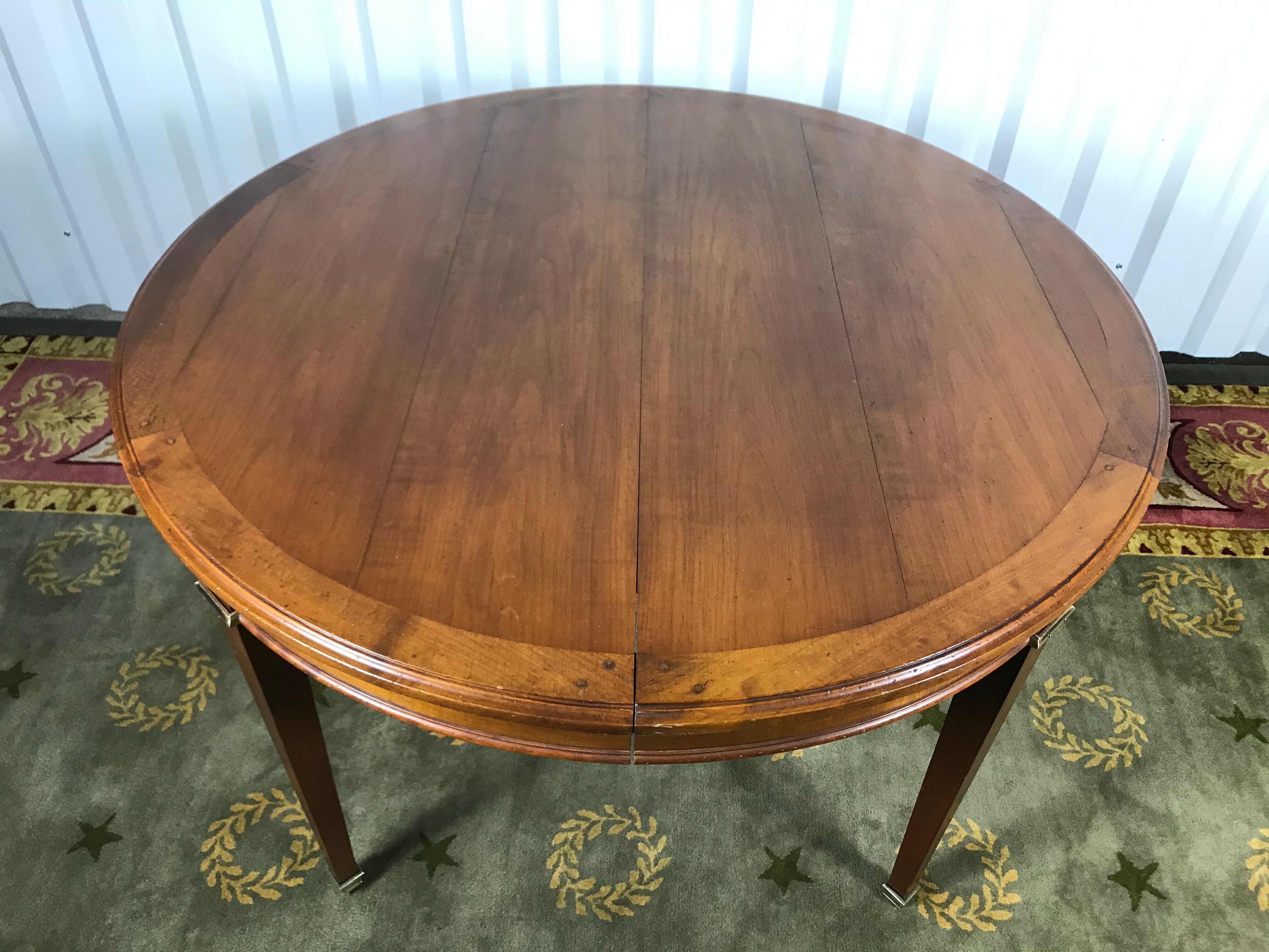 Louis XVI dining room table - 3 cherry extensions