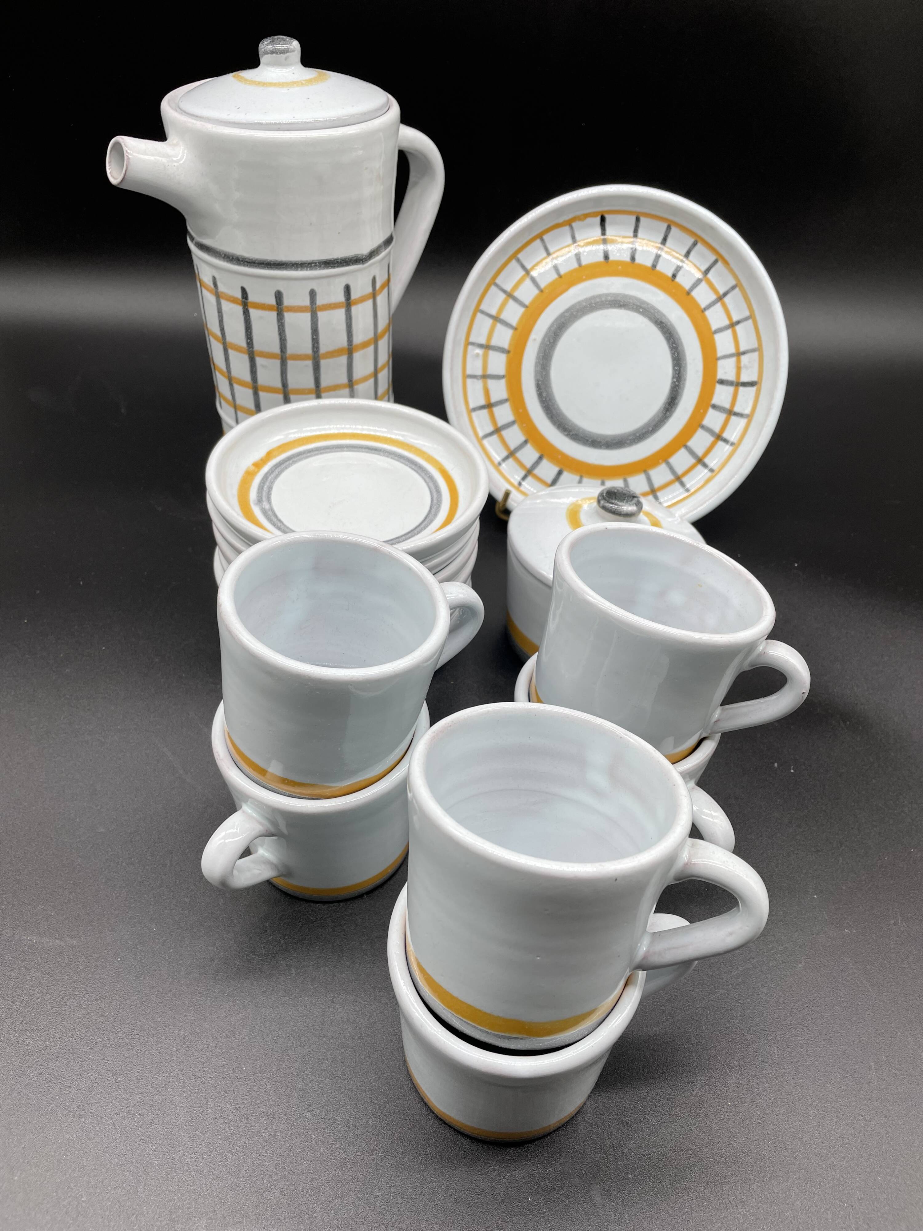 Vintage 1960s coffee service in ceramic, modernist design.