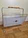 Vintage "Cavalier" magazine rack in white perforated metal and rattan