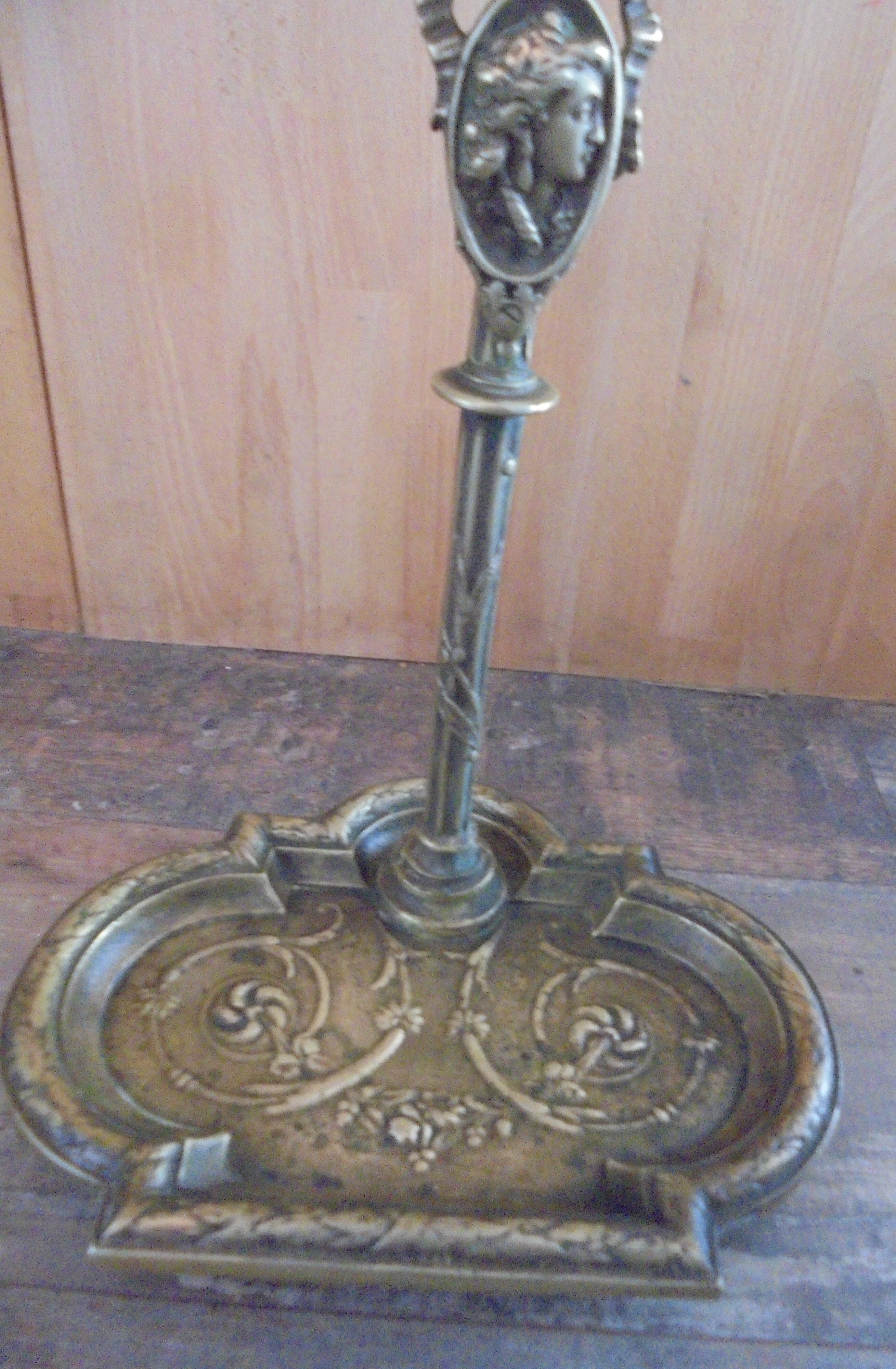 Old bronze fireplace servant decor medallion shovel clamp brooms