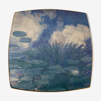 Empty pocket or plate in porcelain from Lunéville Saint Clément, decoration Water Lilies by Claude Monet