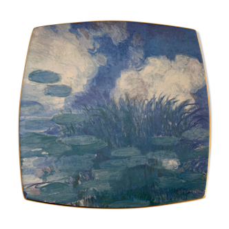 Empty pocket or plate in porcelain from Lunéville Saint Clément, decoration Water Lilies by Claude Monet