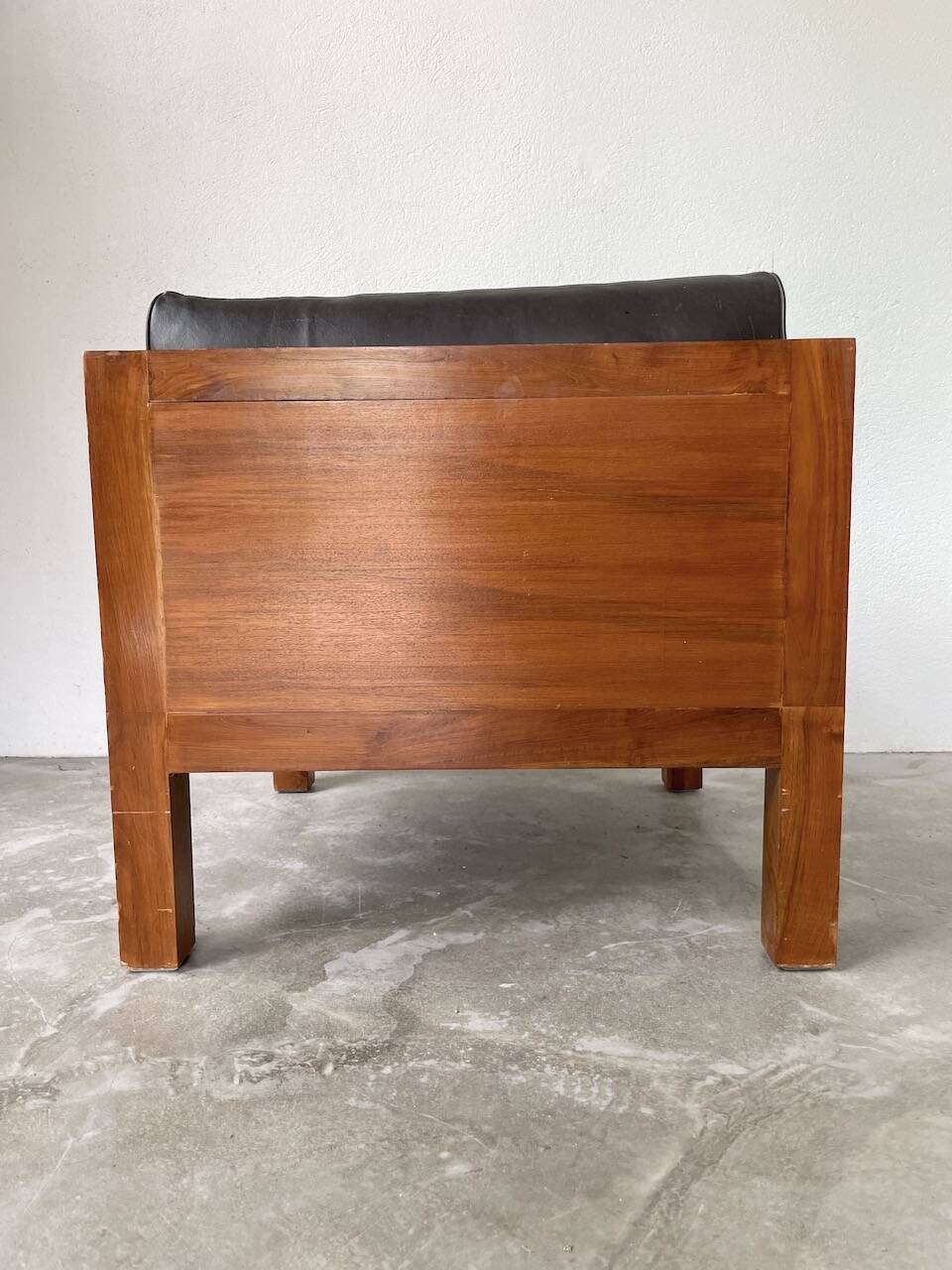 Modernist armchair in exotic wood and leather