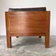 Modernist armchair in exotic wood and leather