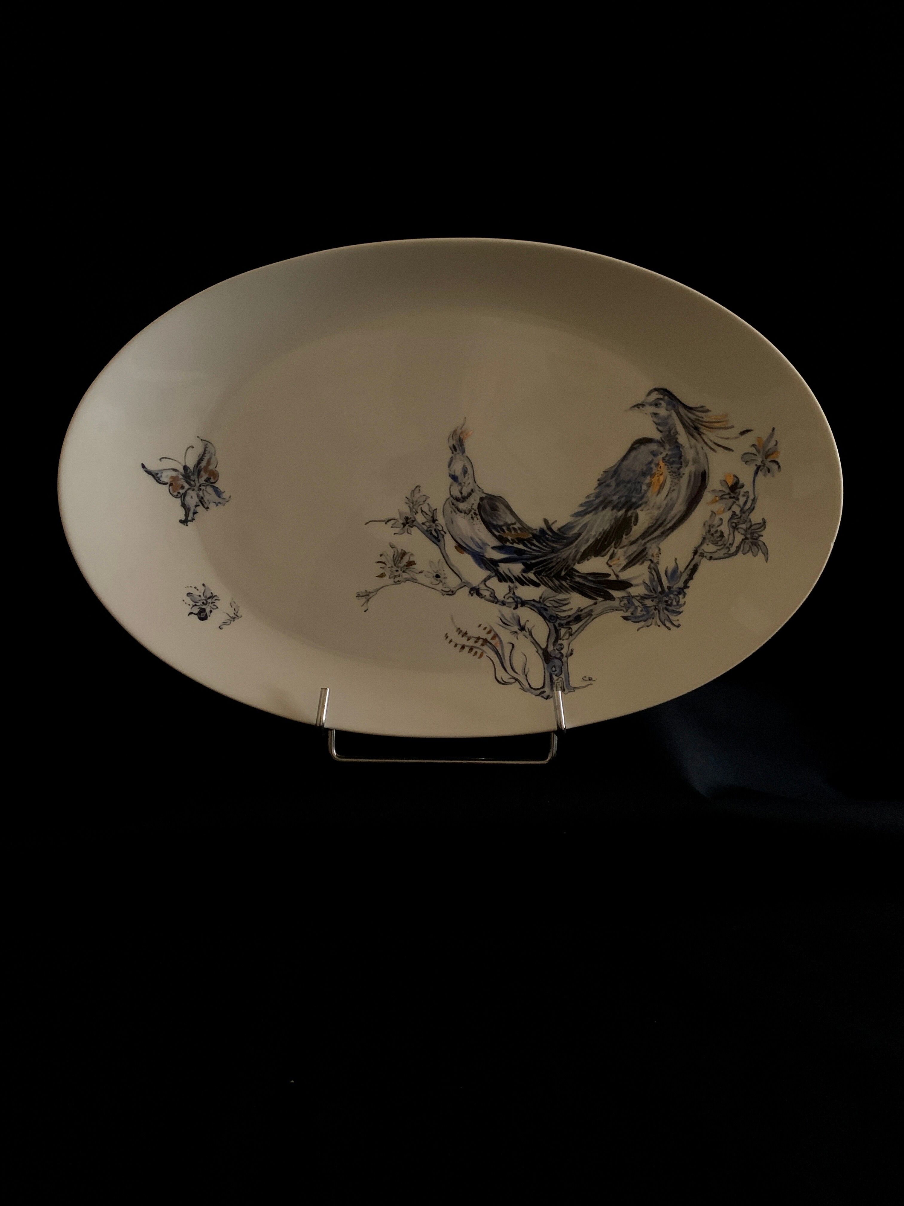 Plate signed Arsberg, "The Buffoon" after a model from the Royal Manufacture of Sèvres.
