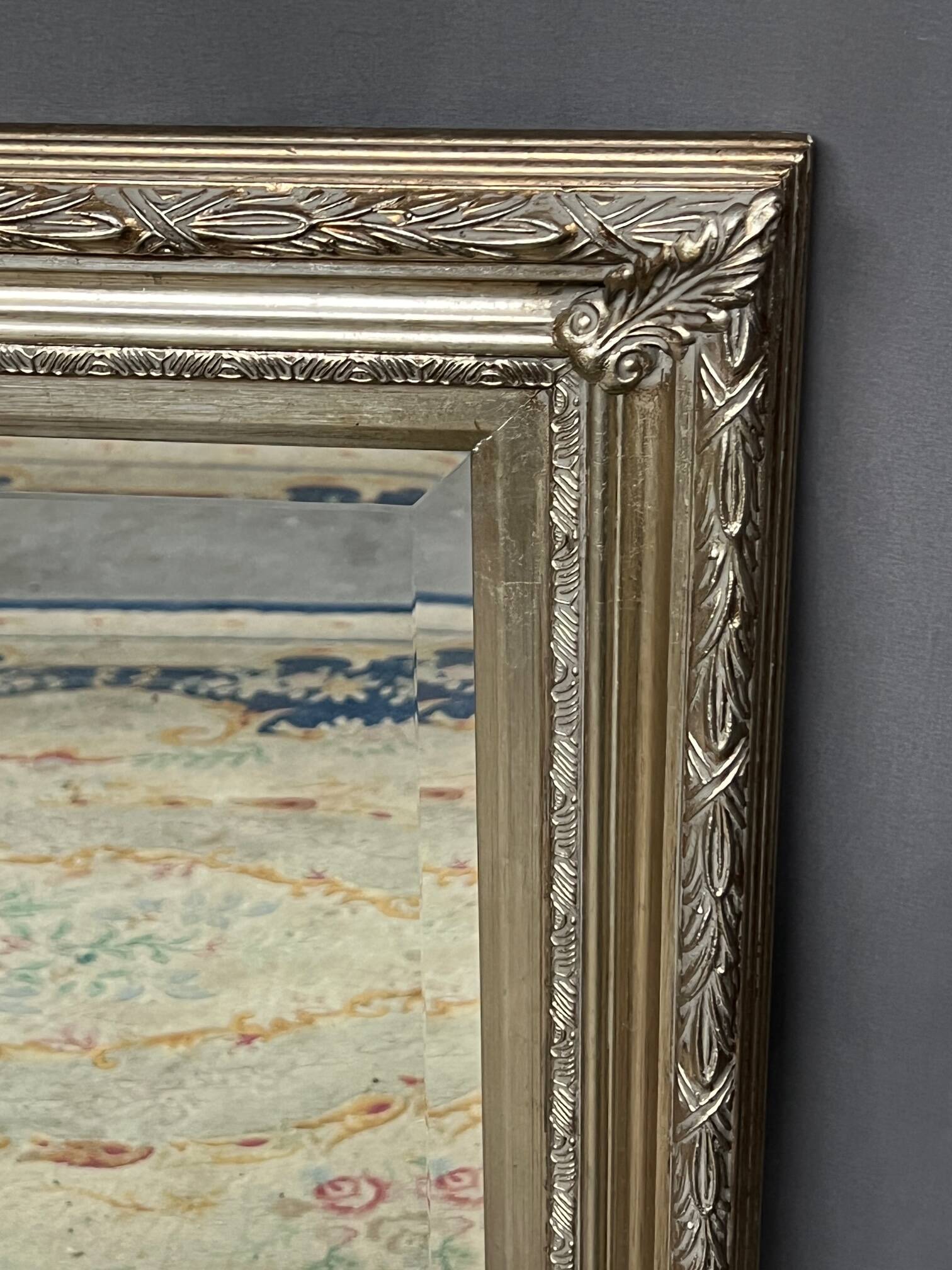 Faux mirror in a beautiful baguette frame