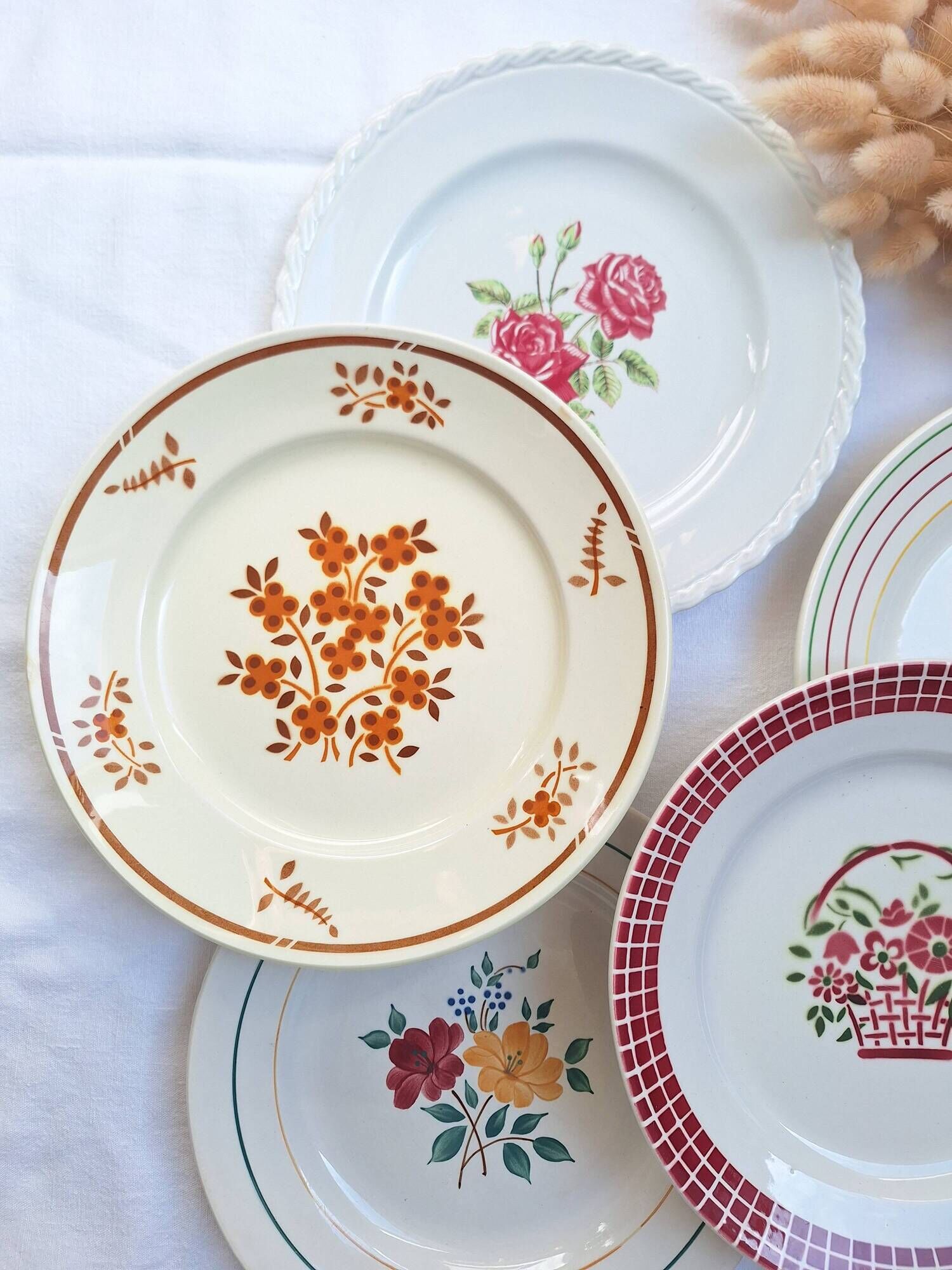 Multicolored flower dinner plates from Moulin des Loups, St Amand and Badonville