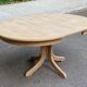 Renovated Scandinavian dining table in solid oak with a central leg from the 1970s.