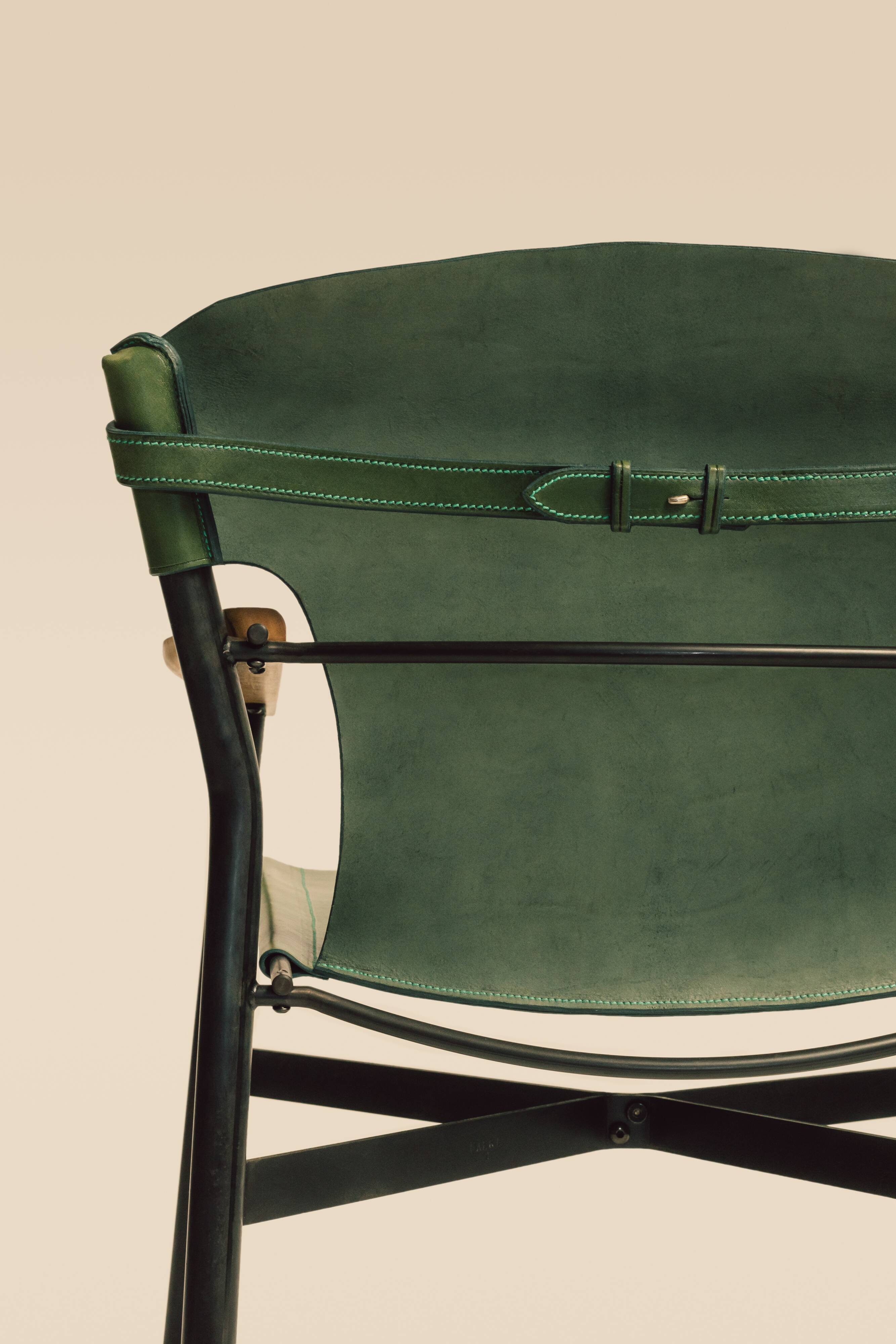 Maërl armchair, Galathée model, green leather, solid wood armrests of your choice