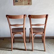Pair of wooden bistro chairs signed Thonet, 1940s