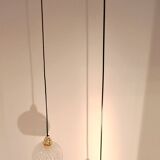 Two-light pendant in a cascade of cut crystal globe