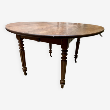 Round oak table with shutters