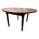 Round oak table with shutters