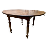 Table ronde en chêne à volets