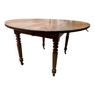 Round oak table with shutters