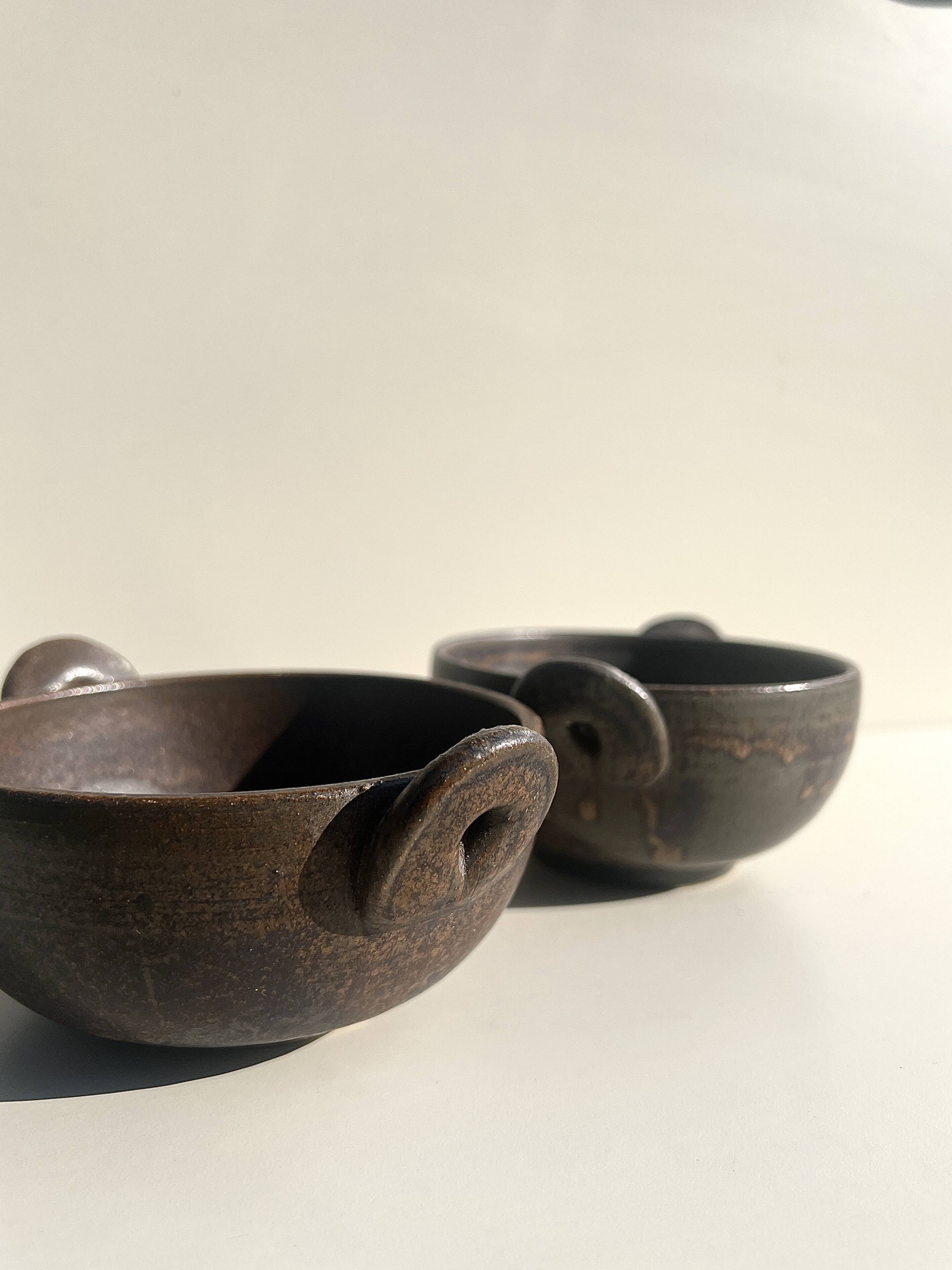 Pair of 2 handmade stoneware bowls, 20th century