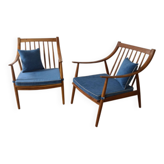 Paire de fauteuils cosy en teck avec coussins
