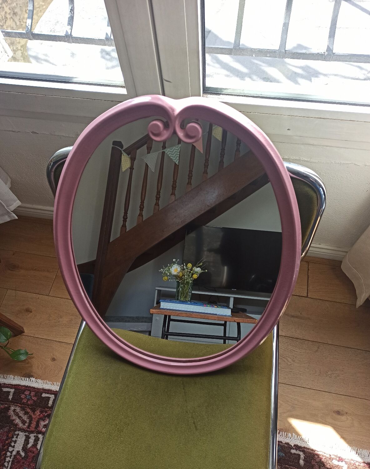 Vintage pink oval cast iron mirror