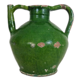 Orjol water pitcher pottery in green glazed terracotta, south-west of France, pyrenees