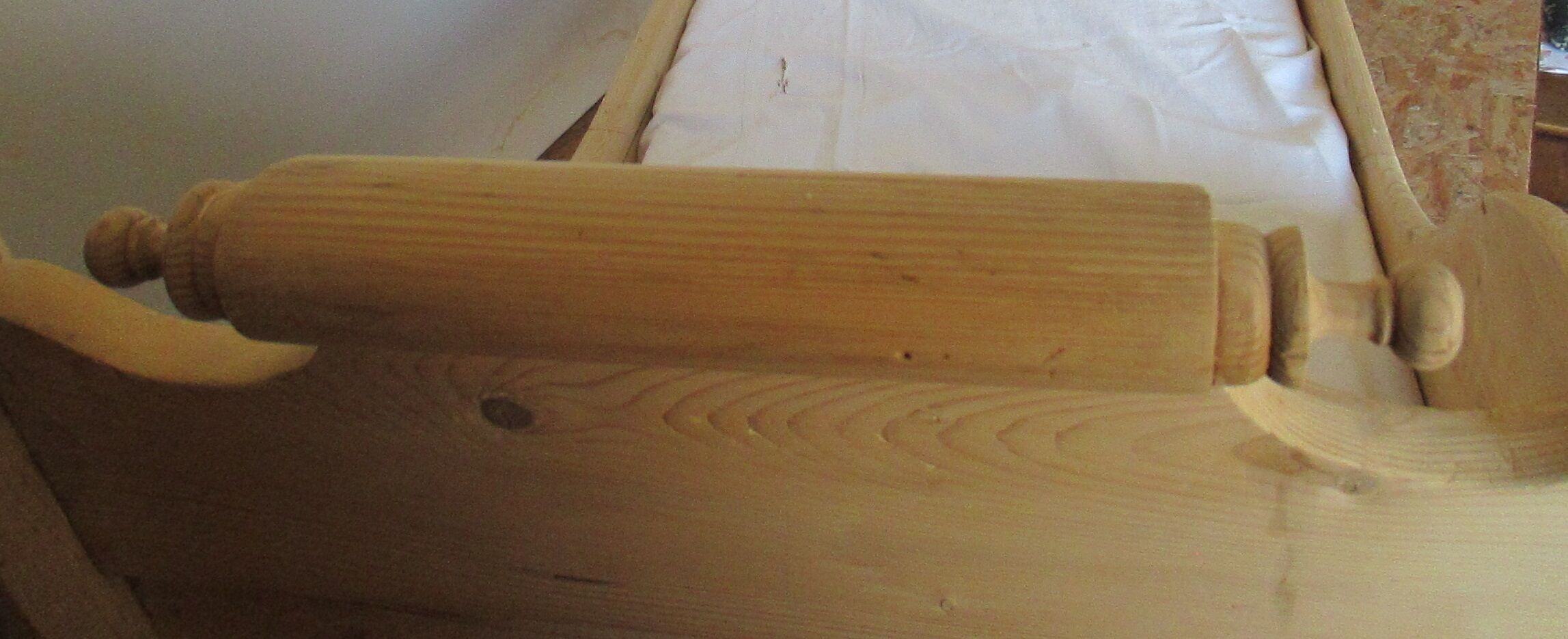 Retractable sofa bed of the Austrian Tyrole in natural wood