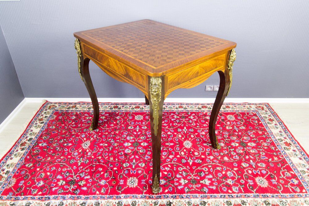 French Louis XV style table with bronze mounts