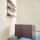 Shelves in rosewood and black lacquered metal from the 50s