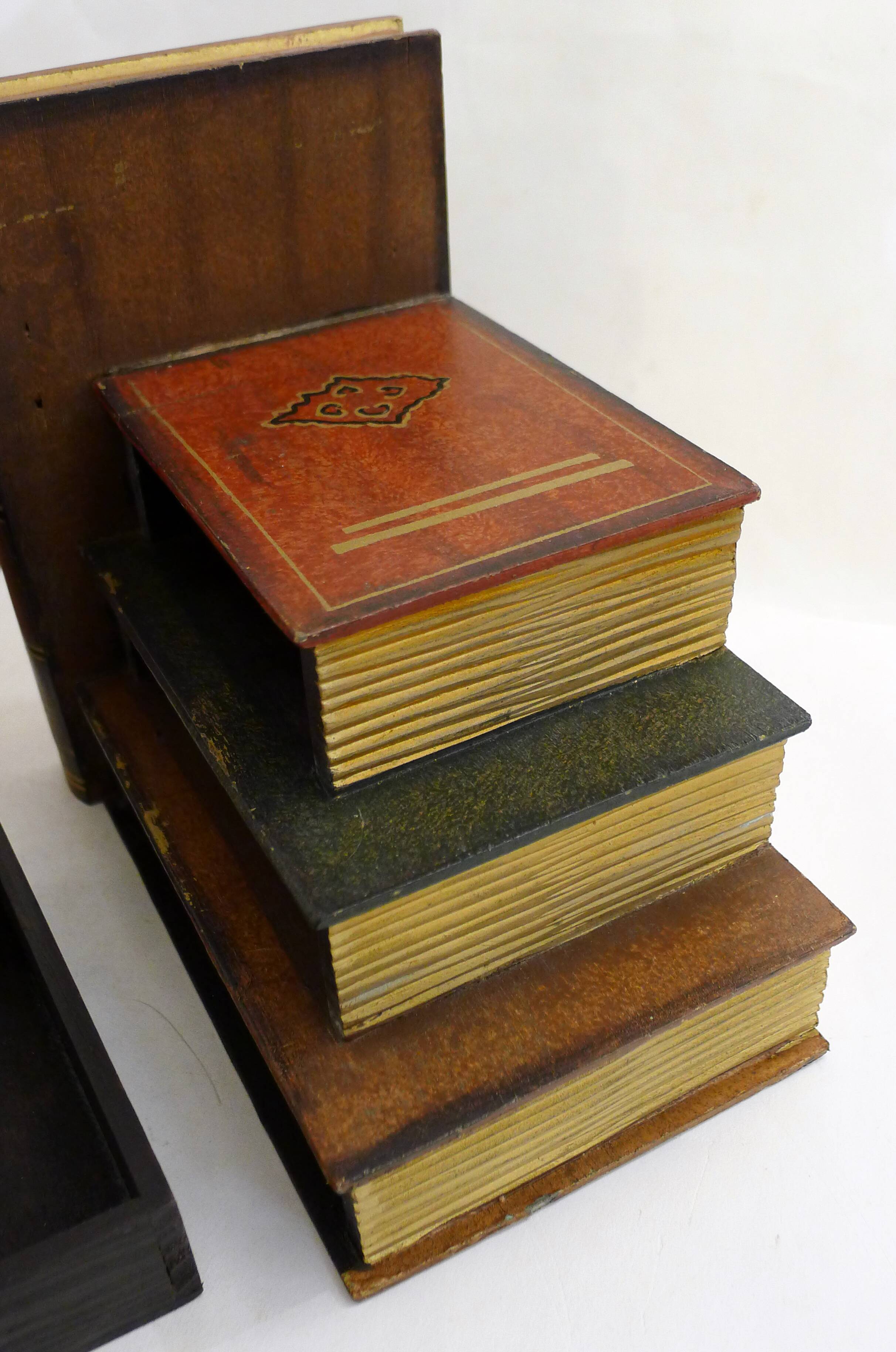 Pair of bookends (& secret boxes) in trompe l'oeil Stacked books