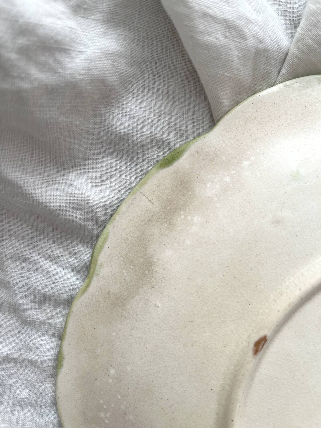 Antique plate in barbotine grapes and vine leaves from Orchies