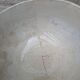 Old opaque porcelain bowl from Gien with a floral decoration.