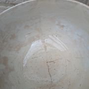 Old opaque porcelain bowl from Gien with a floral decoration.
