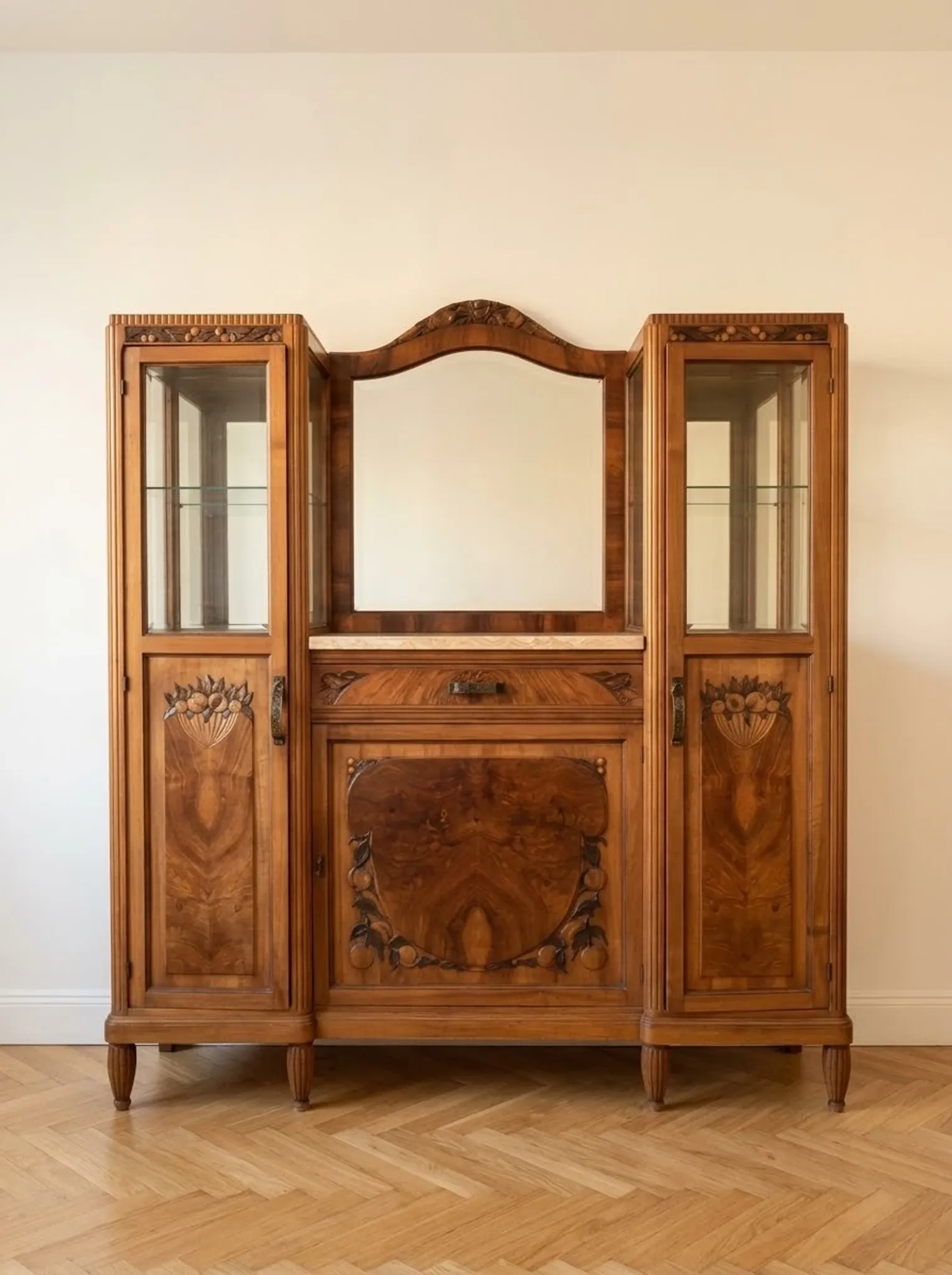 Art Deco display cabinet in walnut and burl, marble top and bevelled mirror, 1930s.