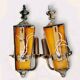 Antique pair of brass bakelite wall lights